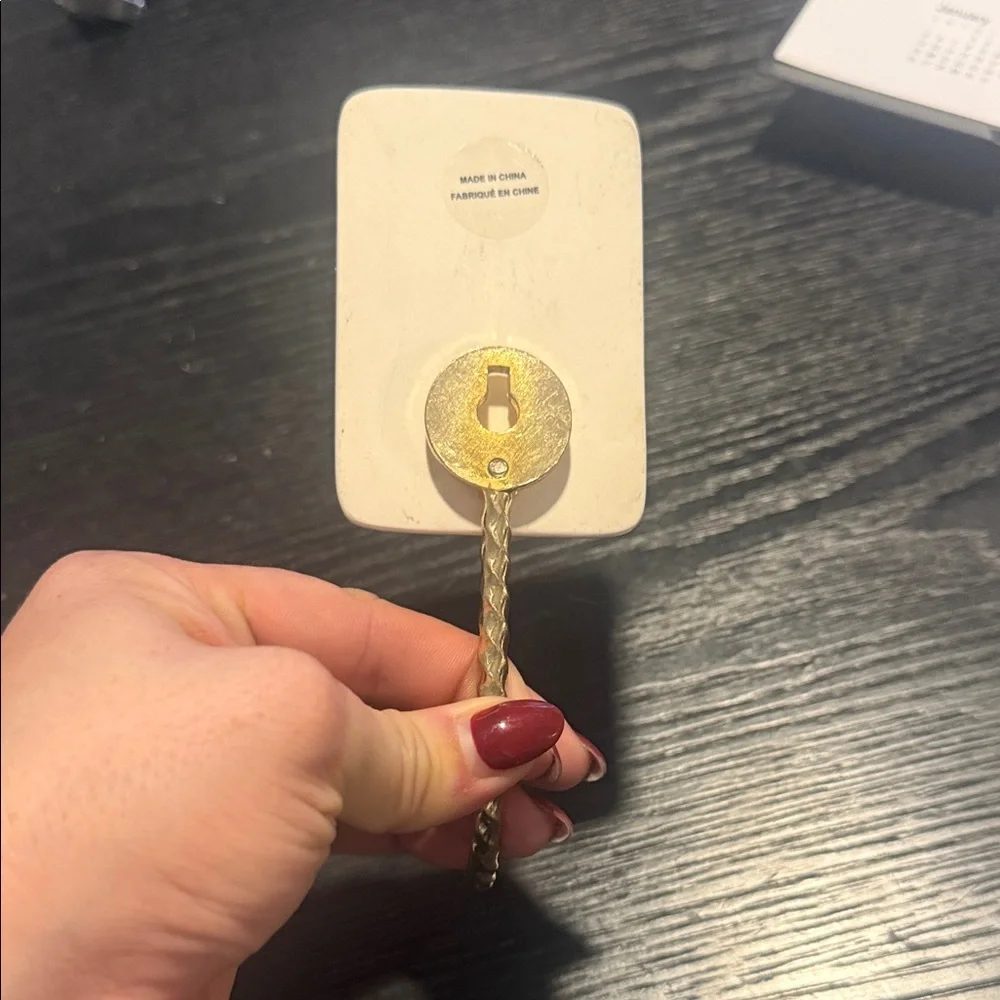 Anthropologie Cream and Gold Wall Hook